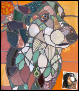 Mosaic portrait of a dog made with ceramic and glass